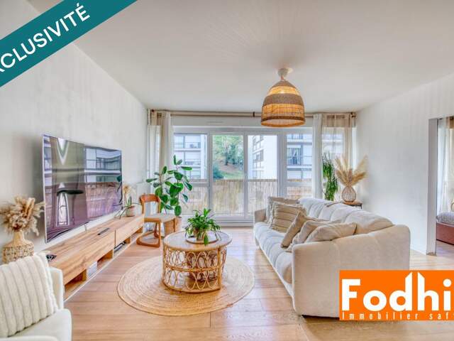 Appartement 4 pièces au 2 éme étage avec ascenseur- cave et 2 parkings. — photo du bien