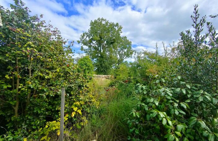 A VENDRE TERRAIN CONSTRUCTIBLE DE 2500 M²  DANS LE BOURG DE GOMMENEC'H — photo 2