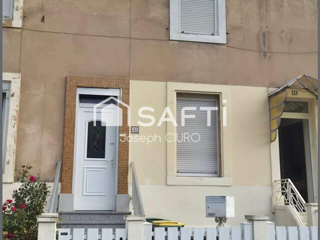 Maison mitoyenne F3,61 m²,terrain 154 m²,2 garages — photo du bien