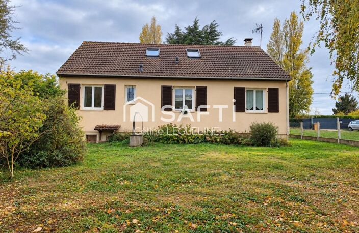 Vie de plain-pied, beaux volumes et dépendance sur un terrain arboré de 2 140 m² — photo 3
