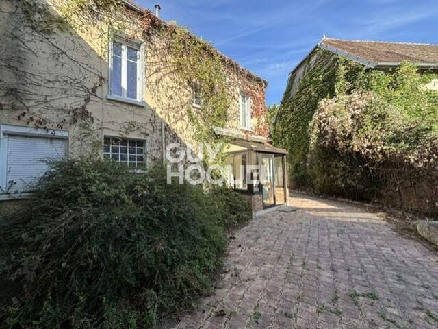 maison — photo du bien