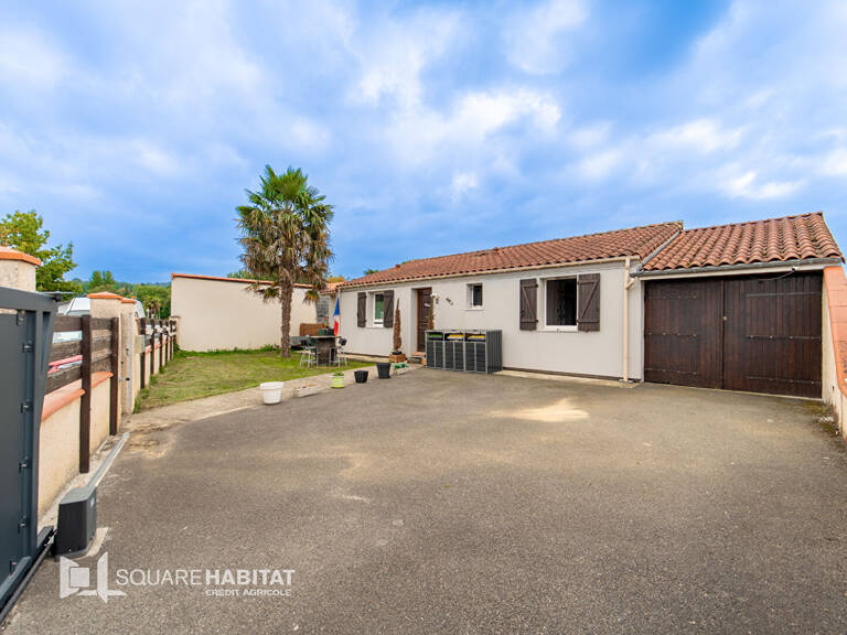 Maison de plain-pied T5 de 115 m² avec jardin - Tournay — photo 1