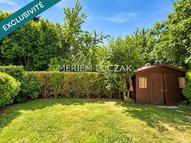 Maison familiale de 94 m² avec jardin, garage et potentiel d'aménagement — photo du bien