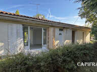 Maison à vendre charmant plain-pied en pierre de taille - 3 chambres - jardin clos et boisé - à FONTCOUVERTE (17100) — photo 2