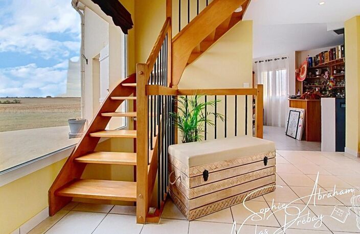 Une maison familiale aux beaux volumes, alliant confort, luminosité et prestations de qualité ! — photo 3