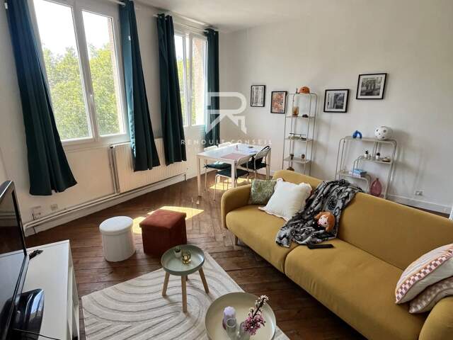 T2 + parking couvert vendu loué — photo du bien