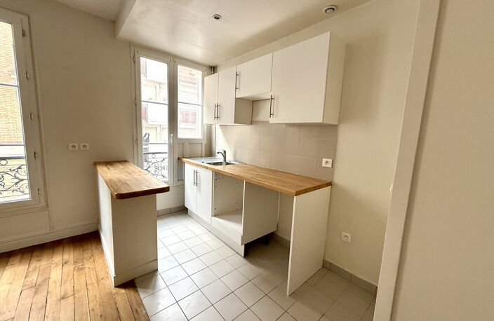 PARIS 14ᵉ – 2 PIÈCES ALLIANT CHARME ET FONCTIONNALITÉ — photo 2