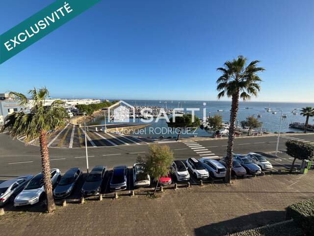 L'ÉLÉGANCE D'UN PIED-À-TERRE FACE AU PORT DE L'AIGUILLON — photo du bien