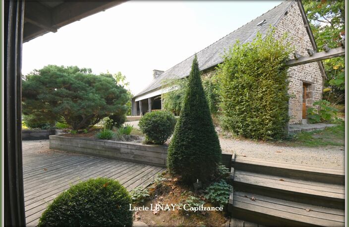 Domaine paysager reconnu avec parc floral, batiments et terres agricoles — photo 4