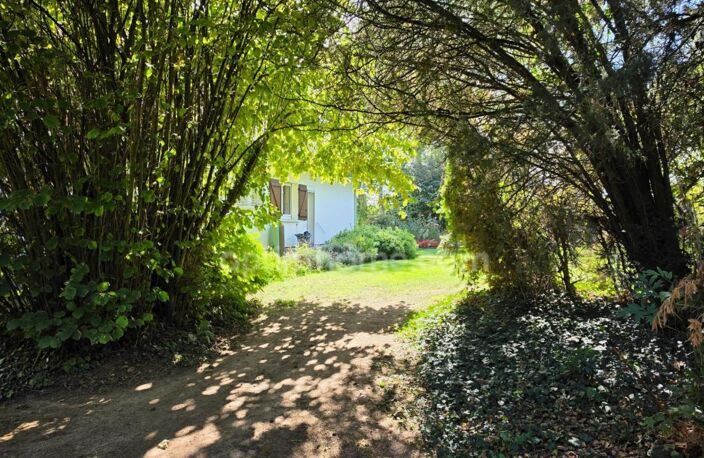 MAISON INDIVIDUELLE SEMI PLAIN-PIED 5 CHAMBRES SOUS-SOL COMPLET JARDIN — photo 4