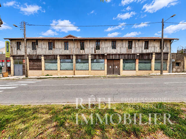 Local commercial de 165 m² aux multiples possibilités en haute ville — photo du bien