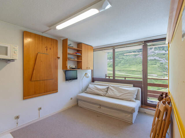 Appartement 1 pièce avec balcon, parking couvert et cellier — photo du bien